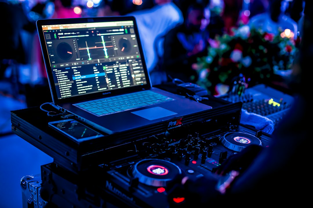 DJ mixing equipment at an event
