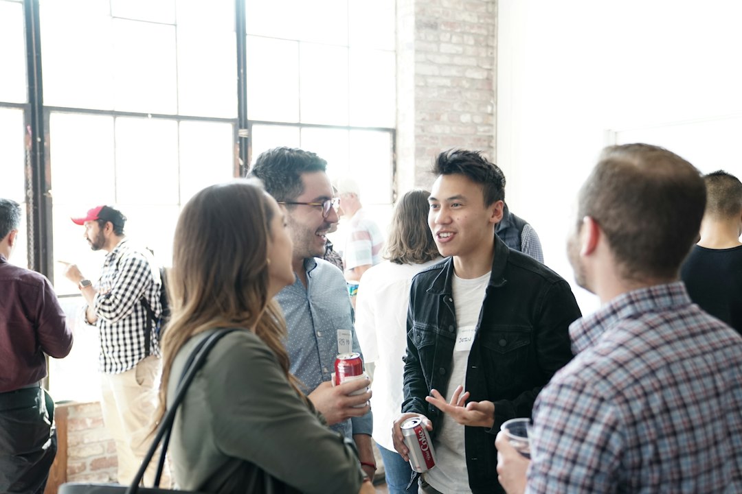 People talking together at a professional event