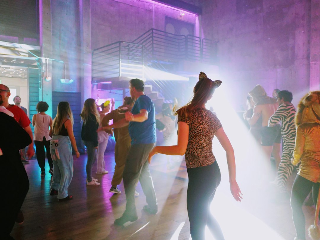 Guests dancing during a colorful social event